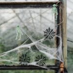 greenhouse window decorated for halloween